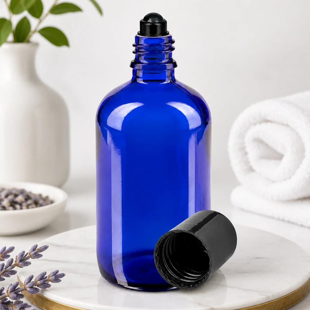 Apothekenflasche blau 100ml Roll-On Verschluss schwarz Zylindrische 100ml Glasflasche Blau mit schwarzem Roll-On Aufsatz geöffnet