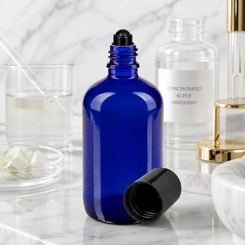 Apothekenflasche blau 100ml Roll-On Verschluss schwarz Hochwertige 100ml Roll-On Glasflasche in Blau mit schwarzem Deckel für professionelle Anwendung