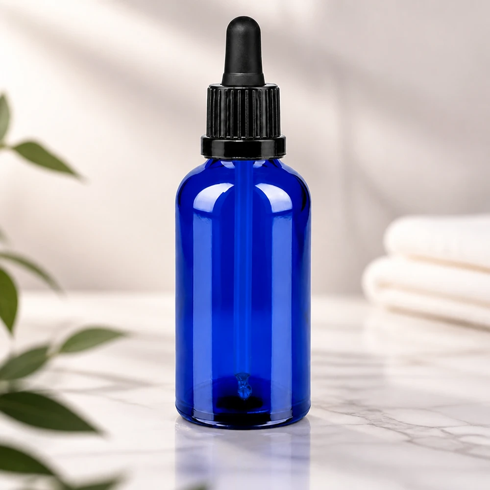 Stilvolle Laborqualität: 50ml blaue Glasflasche mit präzisem schwarzem Pipettensystem