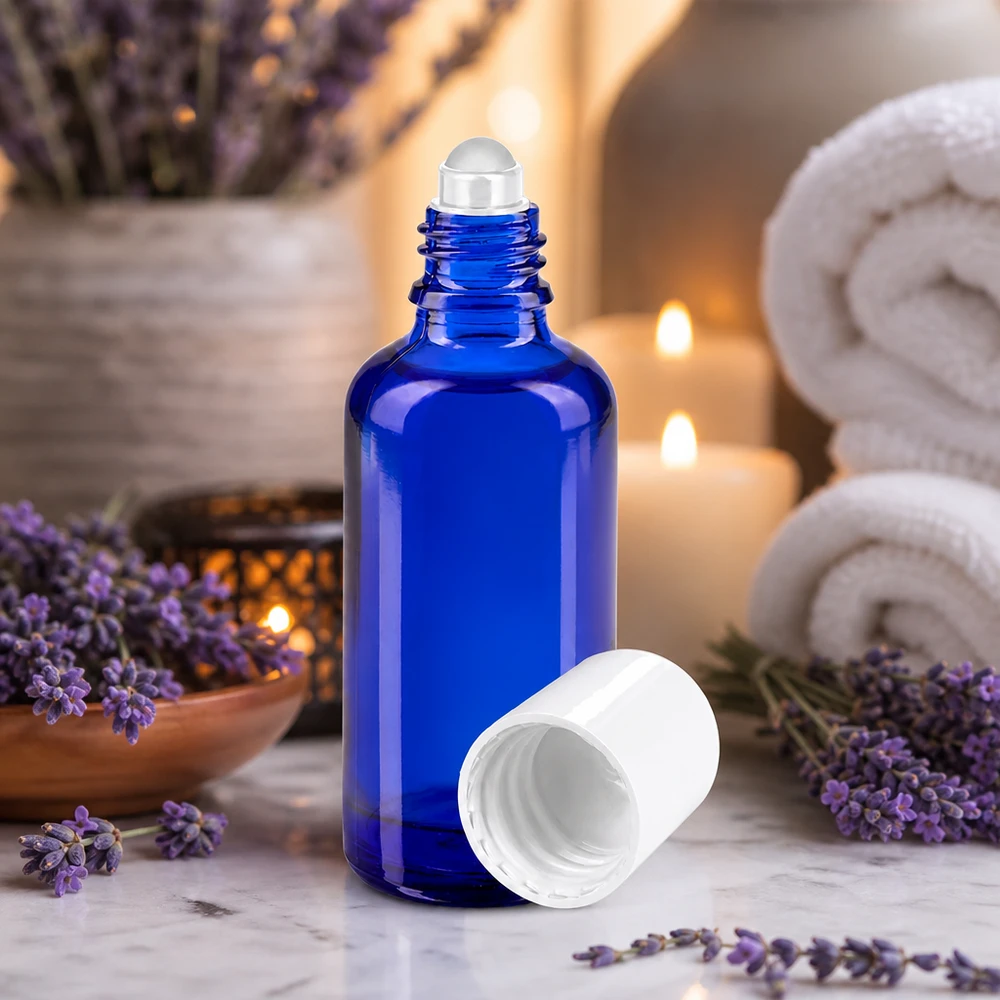 Blaue Rollerflasche 50ml aus Apothekenglas mit weißem STD-Deckel für Kosmetik und Wellness