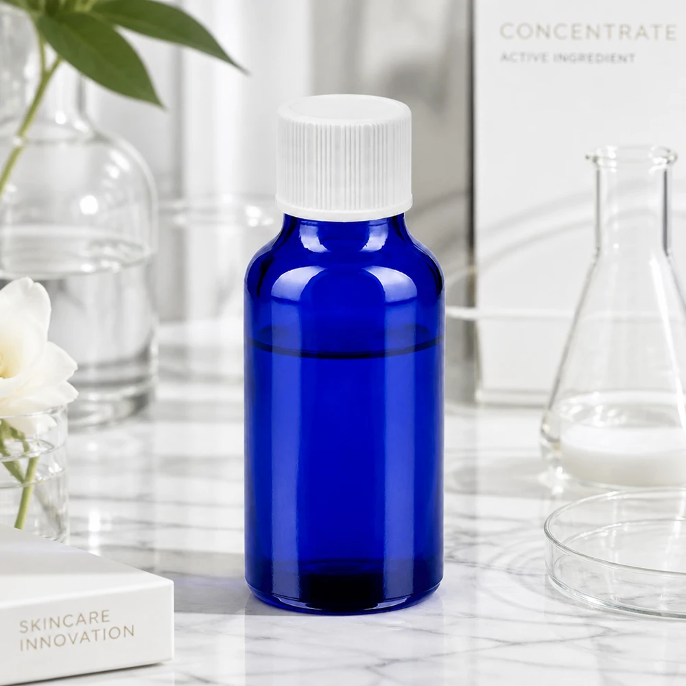 Kompakte blaue Glasflasche 20ml mit weißem Verschluss ideal für Reise und unterwegs