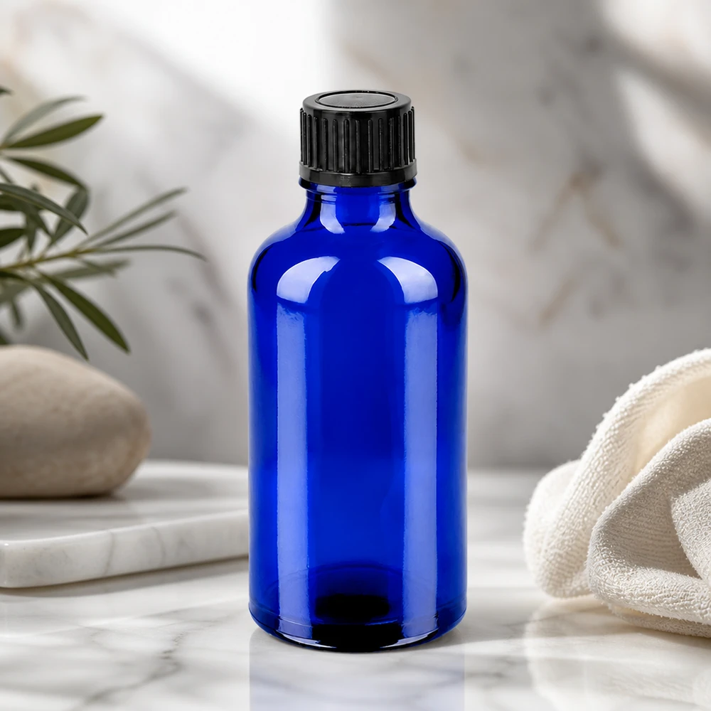 Stilvolle kobaltblaue 50ml Flasche mit mattem schwarzem Verschluss für Premium Produkte