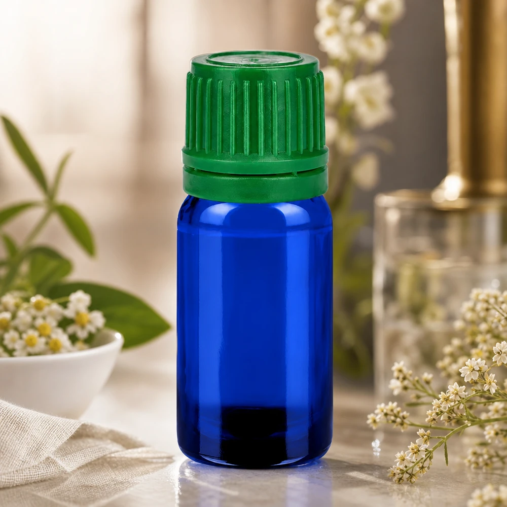 Elegante 5ml Kobaltblaue Glasflasche mit mattiertem grünen Deckel für edle Präsentation