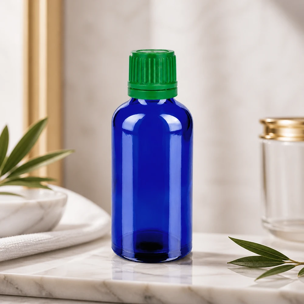 50ml Flasche 11mm Schraubverschluss grün Originalitätsverschluss BlueLine UT18/50 Stilvolle 50ml Kobaltglasflasche mit grünem Deckel für hochwertige Naturkosmetik und Öle