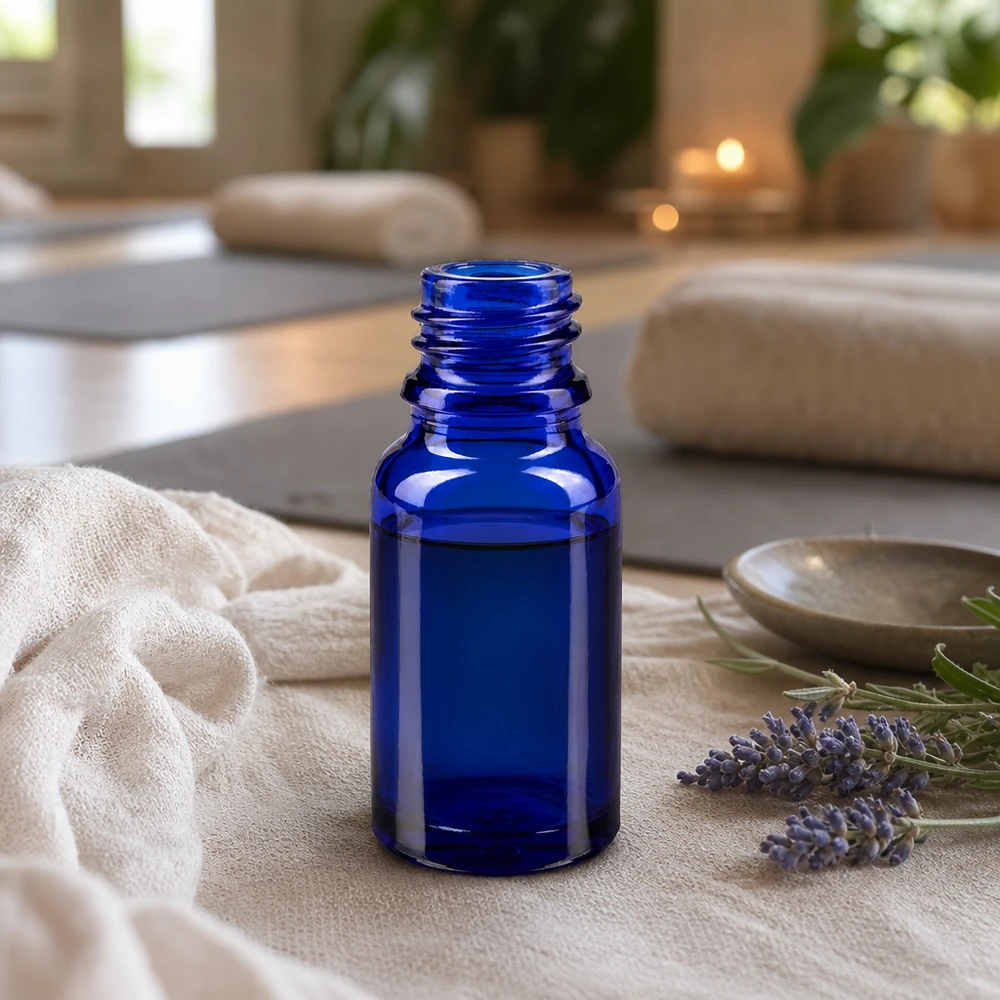 Vielseitige blaue Glasflasche 10ml ApoGlas für Wellness Produkte und natürliche Heilmittel