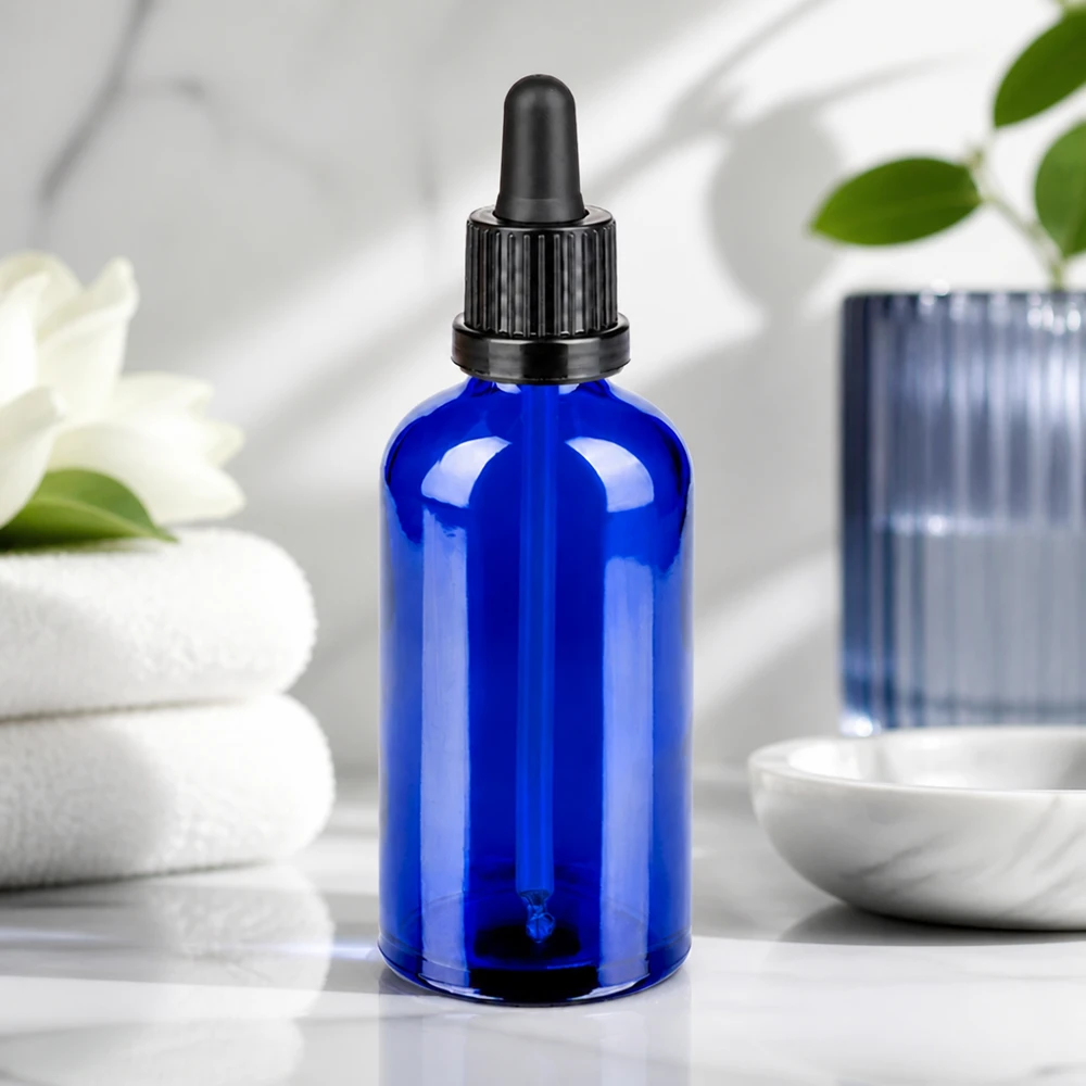 Premium Glasflasche 100ml kobaltblau mit schwarzer Pipette für hygienische und sichere Lagerung