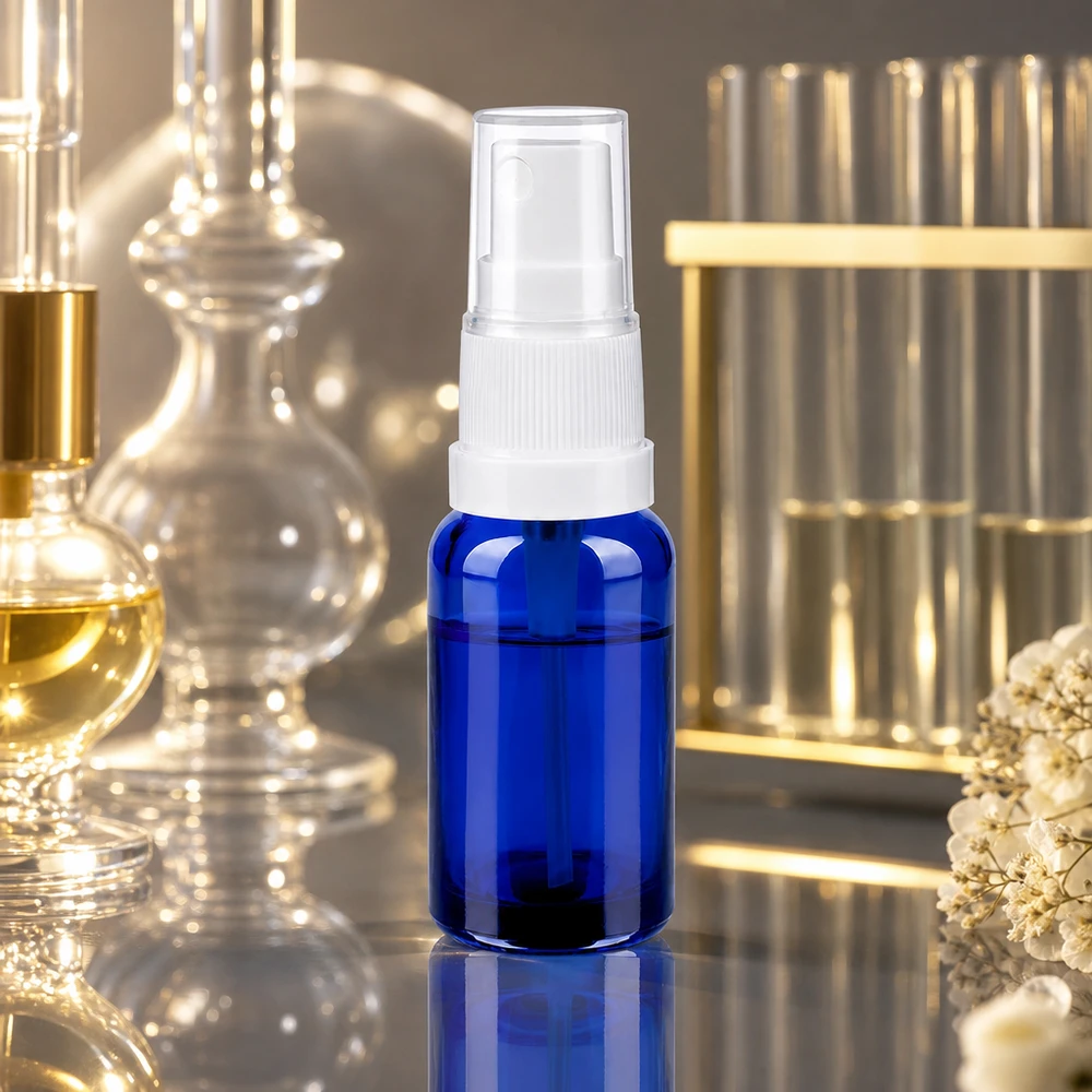 Hochwertige 20ml Glasflasche blau mit auslaufsicherem weißem Sprühkopf für Naturkosmetik