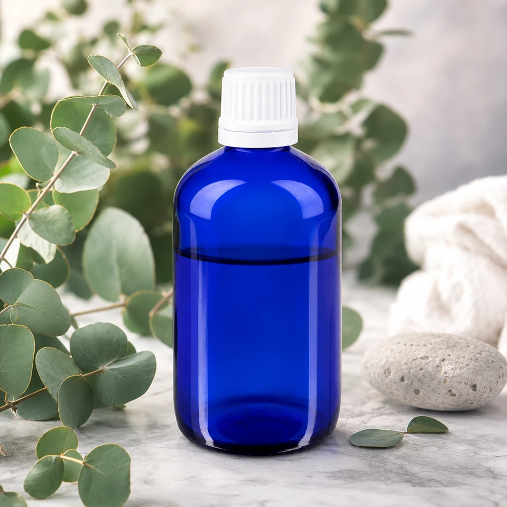 Lichtgeschützte blaue Glasflasche 20ml mit weißem Kindersicherheitsverschluss und Natursteindekor