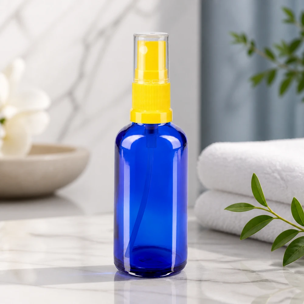 Apothekenflasche blau 50ml Sprayaufsatz gelb Kompakte blaue Sprühflasche aus Glas 50ml mit griffigem gelben Pumpzerstäuber