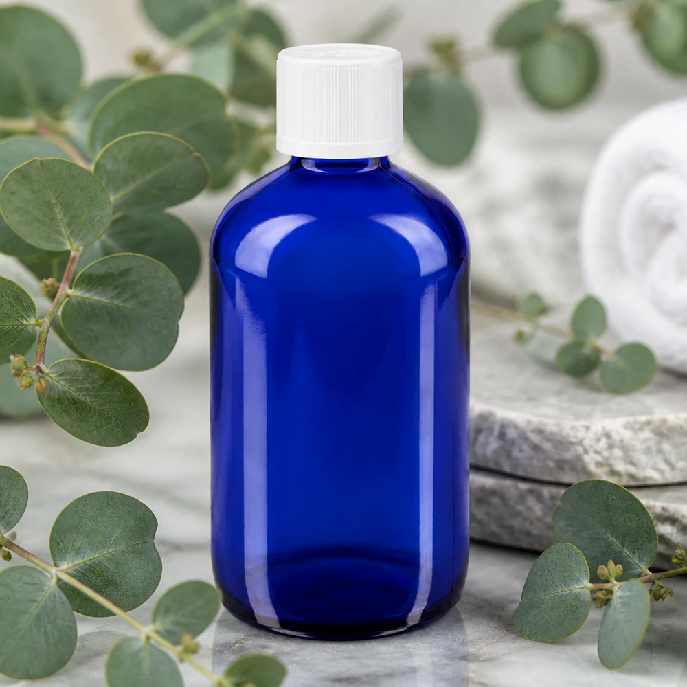 Blaue Rundschulterflasche 100ml Glas mit weißem Sicherheitsverschluss für Naturkosmetik geeignet