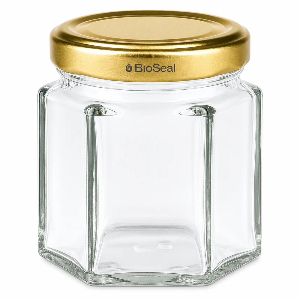 60g Honigglas mit goldenem Deckel BioSeal UNiTWIST 60g Honigglas sechseckig mit goldenem Schraubdeckel BioSeal UNiTWIST für Honig und Marmelade