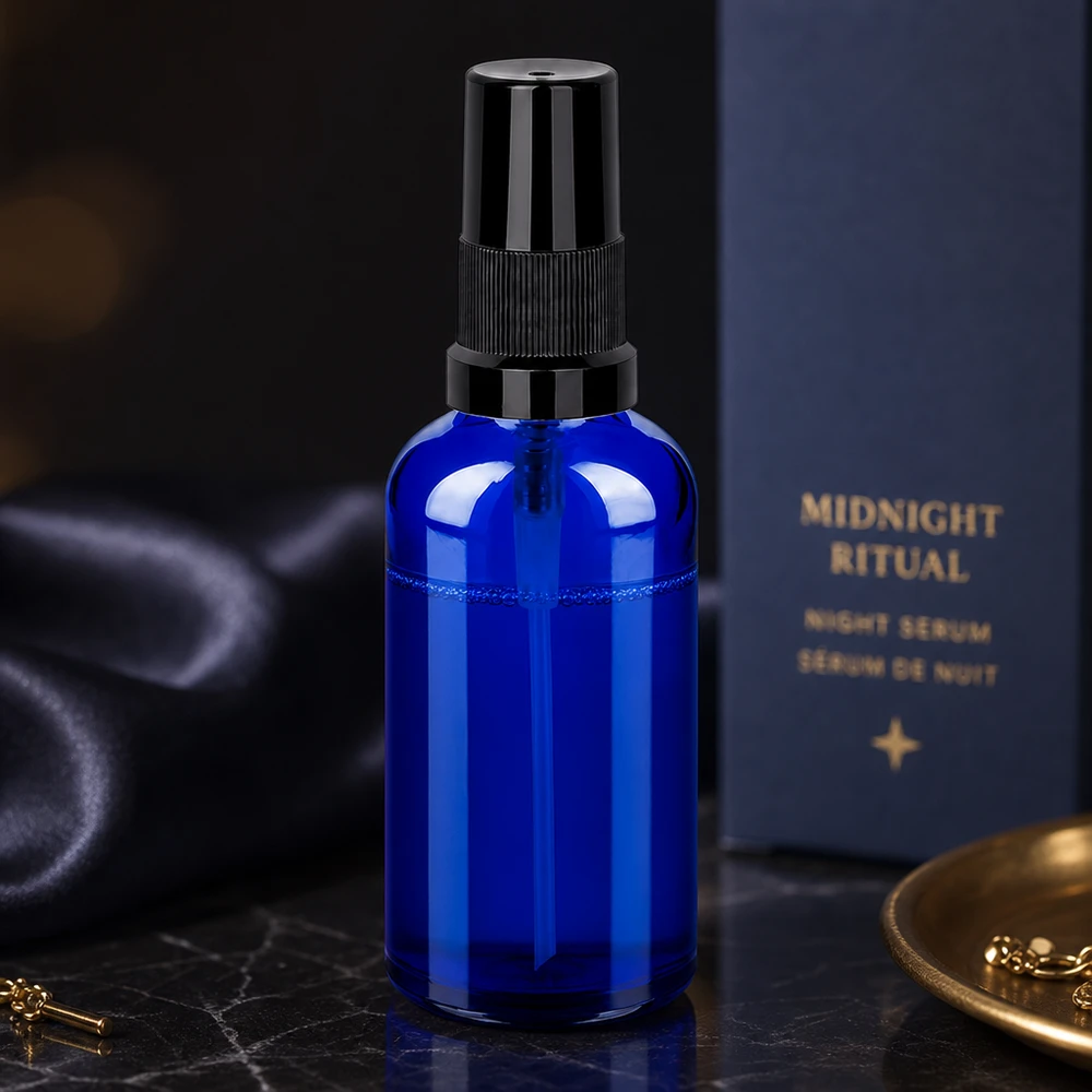 50ml Sprayflasche schwarz Standardverschluss BlueLine UT18/50 Elegante blaue 50ml Sprayflasche aus Glas mit schwarzem Sprühkopf für natürliche Pflegeprodukte