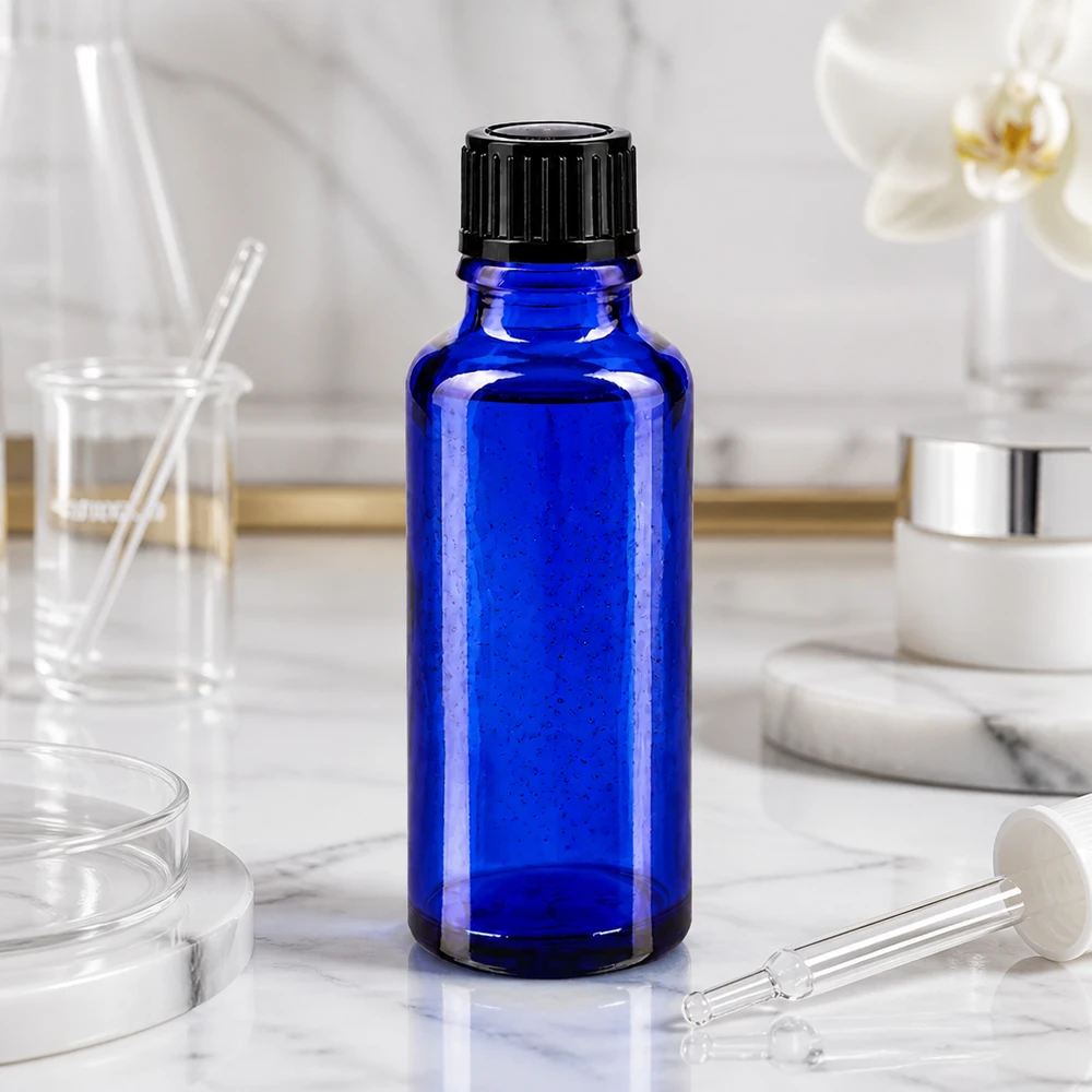 Apothekenflasche blau 30ml Schraubverschluss schwarz Standard Zylindrische 30ml Apothekerflasche aus kobaltblauem Glas mit schwarzem 11mm Verschluss