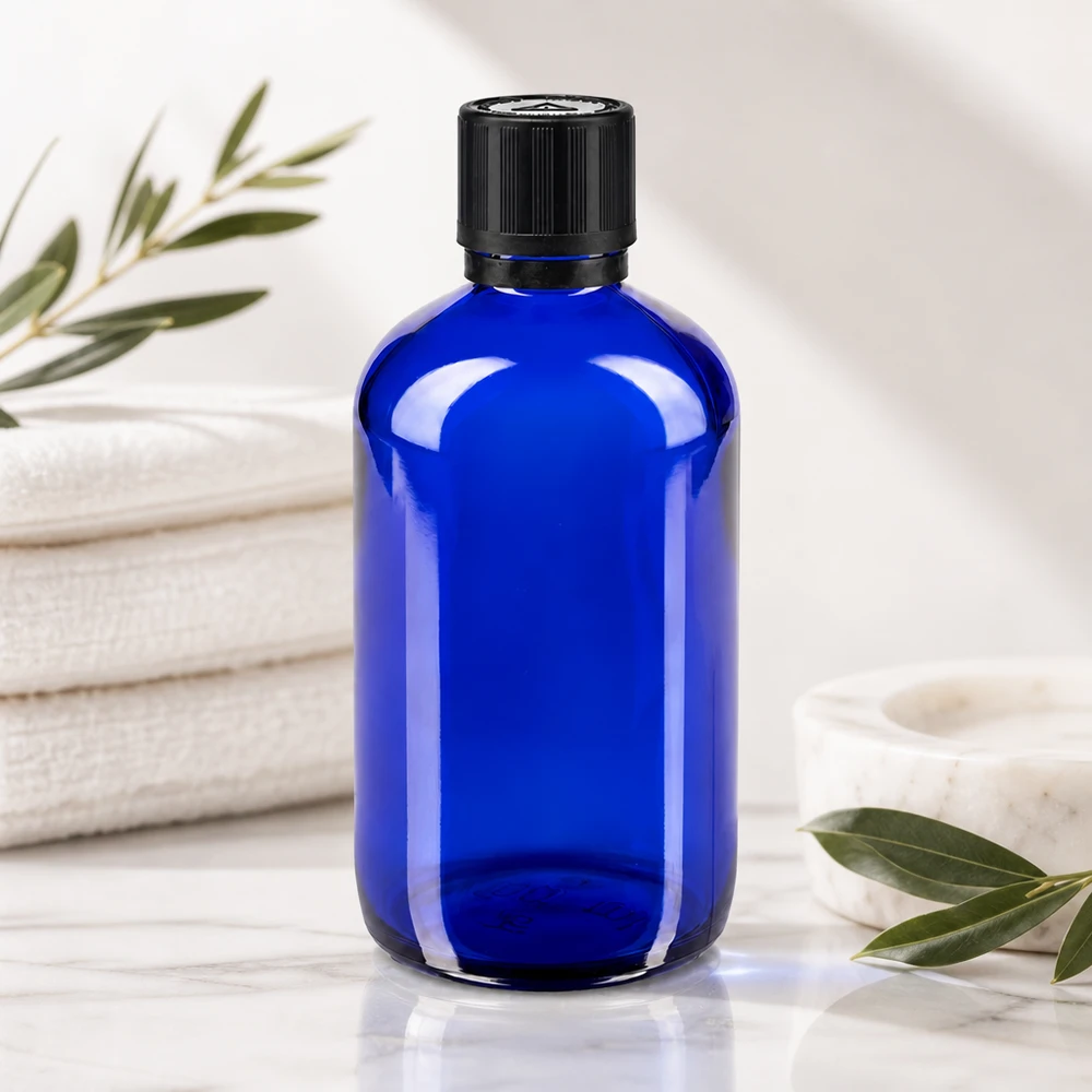 Apothekenflasche blau 100ml Tropfer Premium 1mm schwarz Kindersicherung Blindenwarnsymbol Originalitätsverschluss Blaue 100ml Glasflasche mit Tropfer Kindersicherheitsverschluss ideal für ätherische Öle