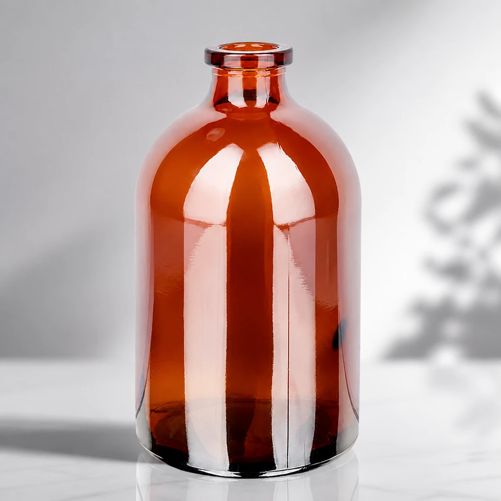Sterile Glasflasche 100ml in Bernsteinfarbe mit charakteristischer Apothekerflasche-Silhouette