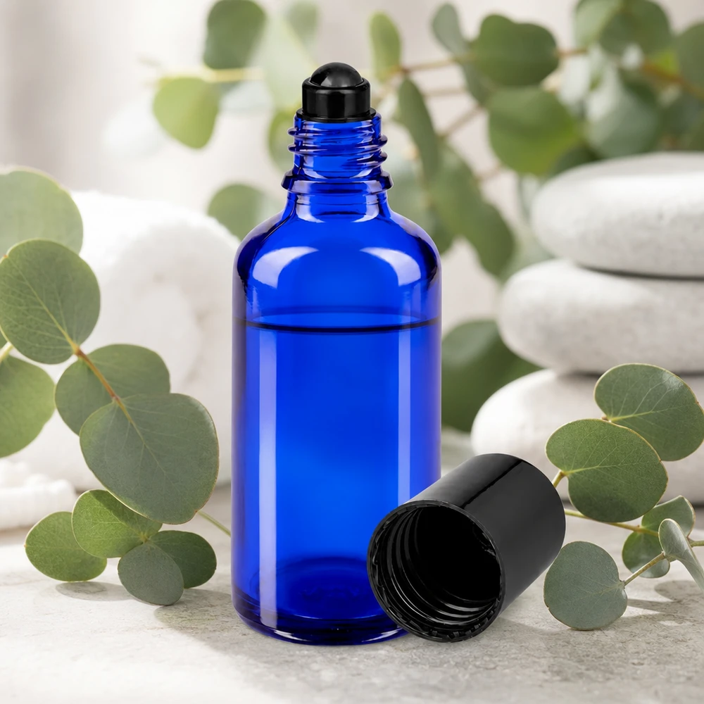 Apothekenflasche blau 50ml Roll-On Verschluss schwarz Zylindrische blaue 50ml Roll-On Glasflasche mit mattem Schwarzdeckel für Naturkosmetik