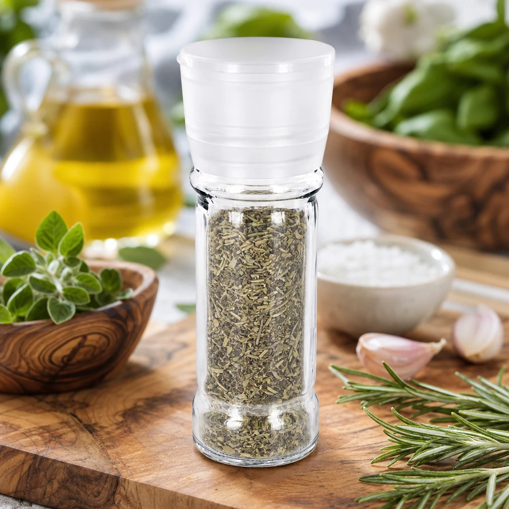 Salz-/Gewürzglas 100ml mit Mühle Vario weiss Zylindrisches Gewürzglas 100ml mit Vario Mühle weiß gefüllt mit getrockneten Kräutermischungen