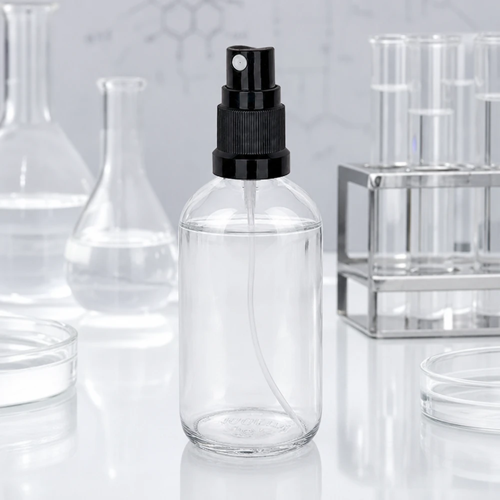 100ml Sprayflasche schwarz Standardverschluss ClearLine UT18/100 Kompakte 100ml Apothekerflasche aus Klarglas mit schwarzem Sprühkopf im Laborstudio