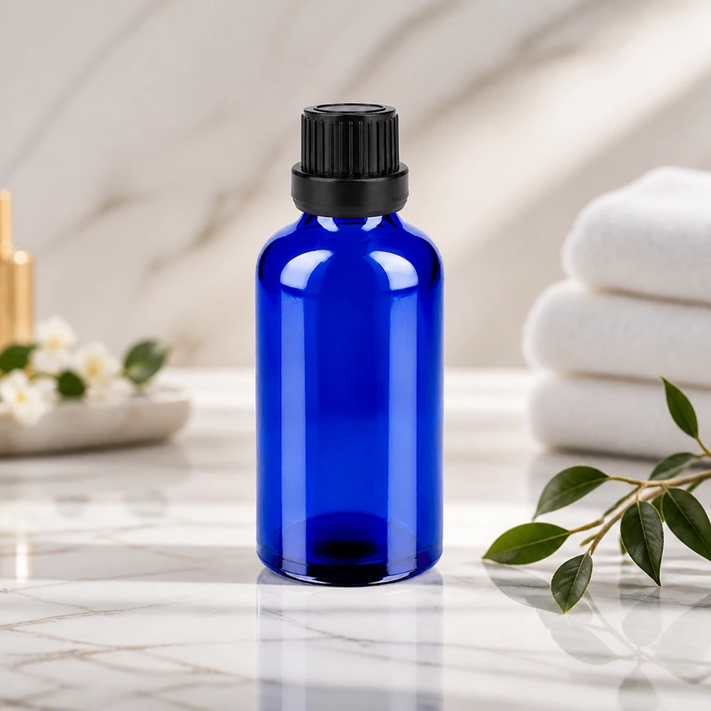 50ml Flasche 11mm Schraubverschluss schwarz Originalitätsverschluss BlueLine UT18/50 Premium Glasverpackung 50ml in elegantem Blau mit schwarzem Verschluss für hochwertige Produkte